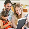 Family reading a book