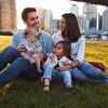 Family sitting on a ground in the park