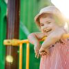 Little girl laughing on playground