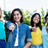 Group of girls pointing with theirs fingers