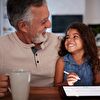 Grandfather and grandchild smiling and seeing each other